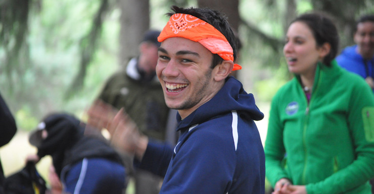 Mark Leitch, a student leader of the ORION Wilderness Experience program, with first-year students at Little Flat Fire Tower in Rothrock State Forest.